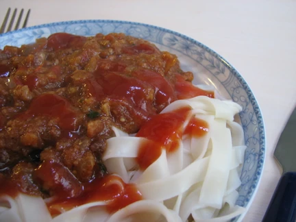 A portion of noodles with pasta sauce